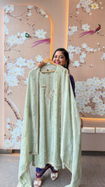 Pretty pretty tissue with heavy pearl work in mint green