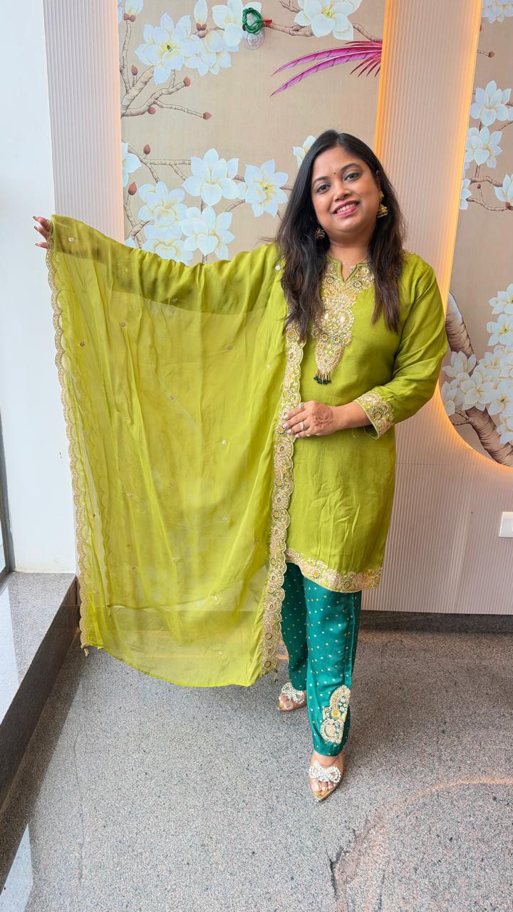 Designer suit set in soft silk fabric true to size in green paired with organza dupatta n zari detailing