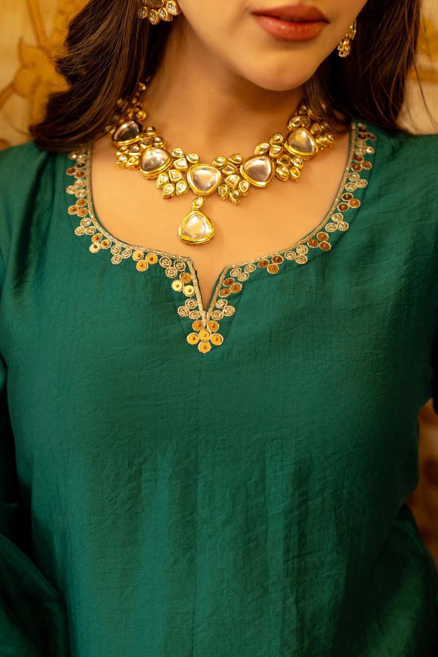 Gorgeous suit back in new colour! Santoori silk dress plazzo set with intricate embroidery in green