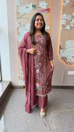Pretty hand work dola silk suit set with pearl detailing and heavy handwork in wine
