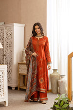 Heavy German rayon suit set paired with kalamkari dupatta in rust fully embroidered
