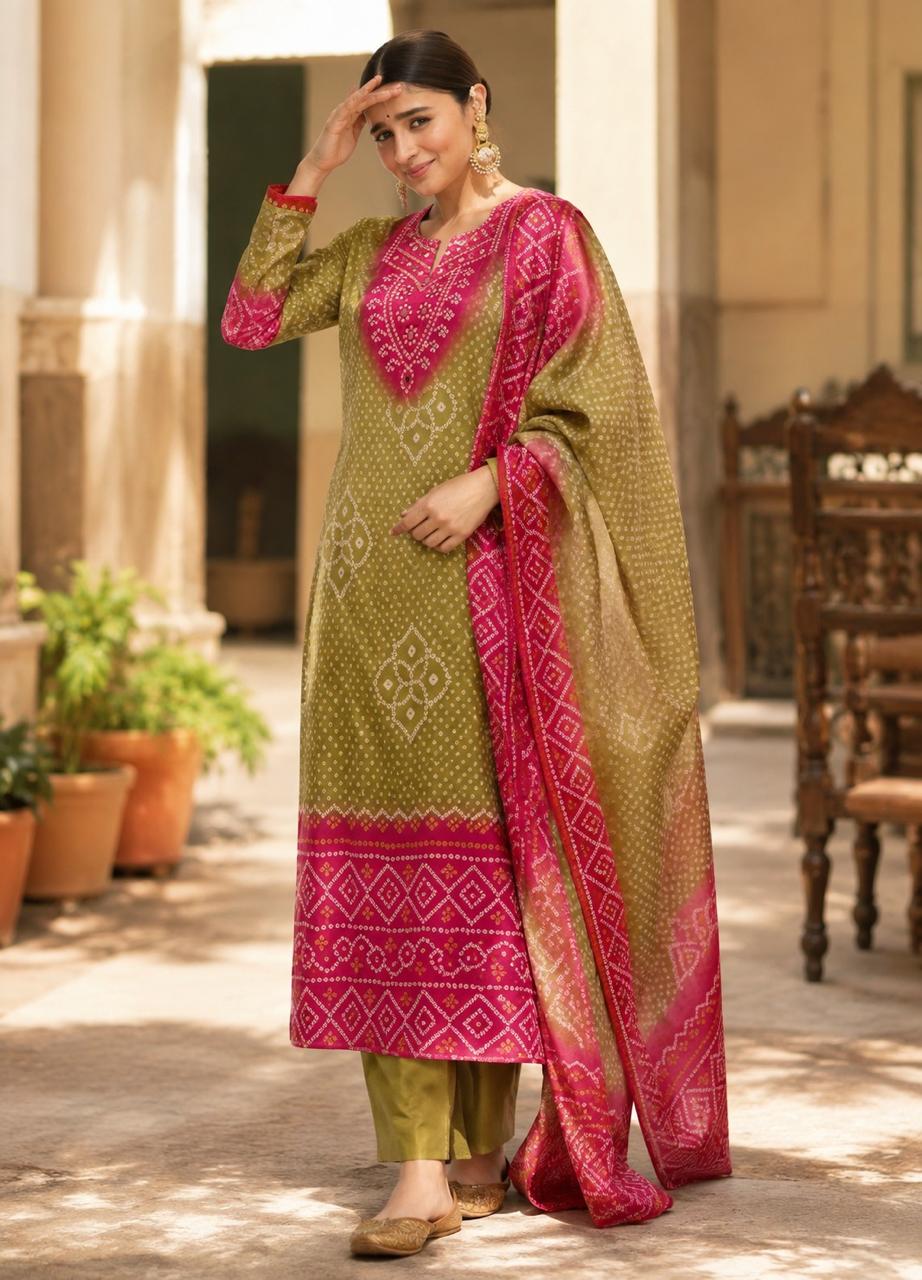 Premium gaji silk bandhani paired with orgenza duppatta in green n pink