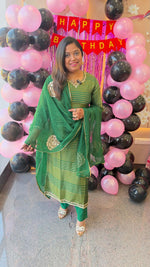 Pretty tissue suits with designer back n dupatta in green slim fit