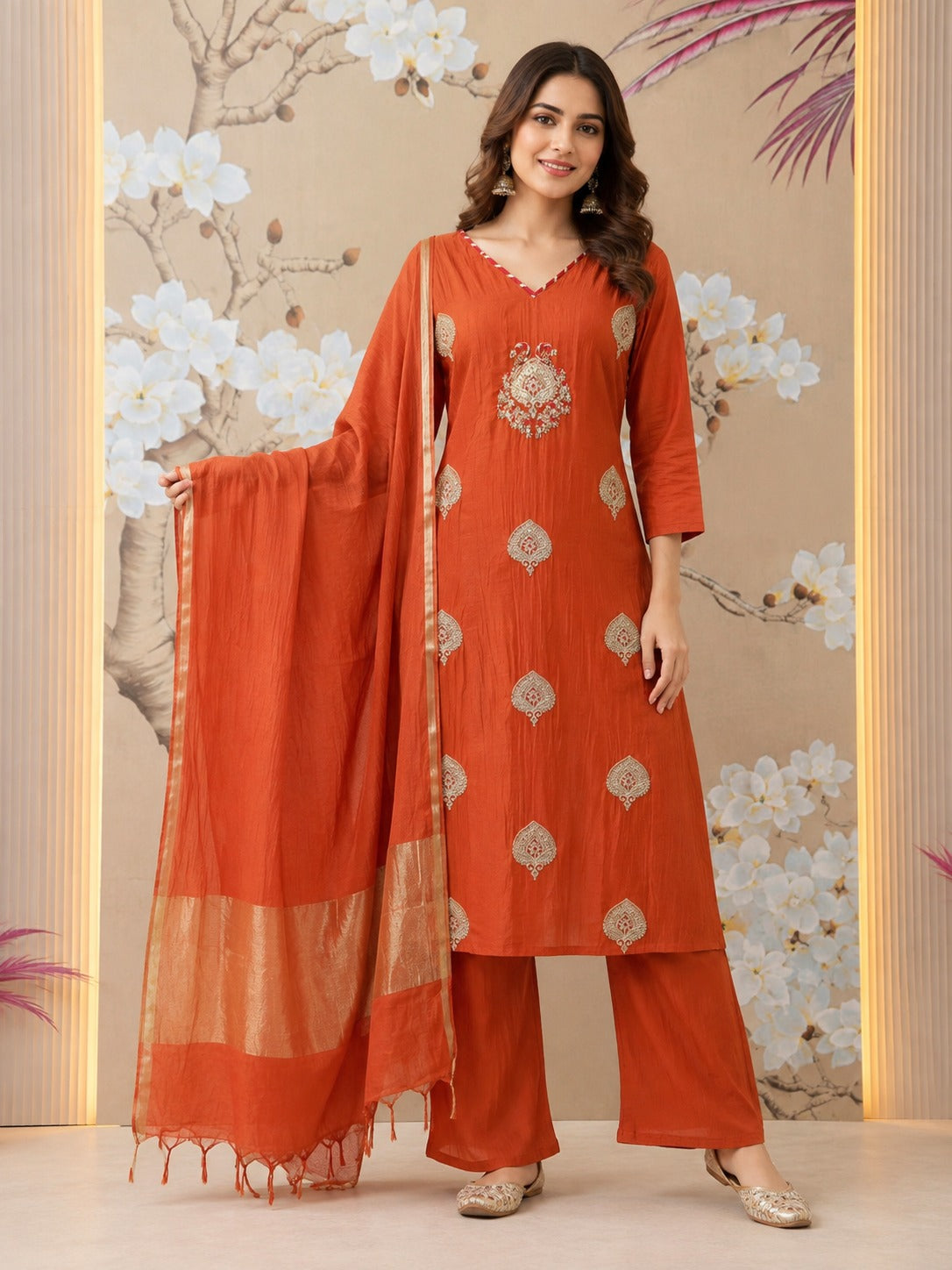 Premium zari detailing Mul chanderi suit set in orange