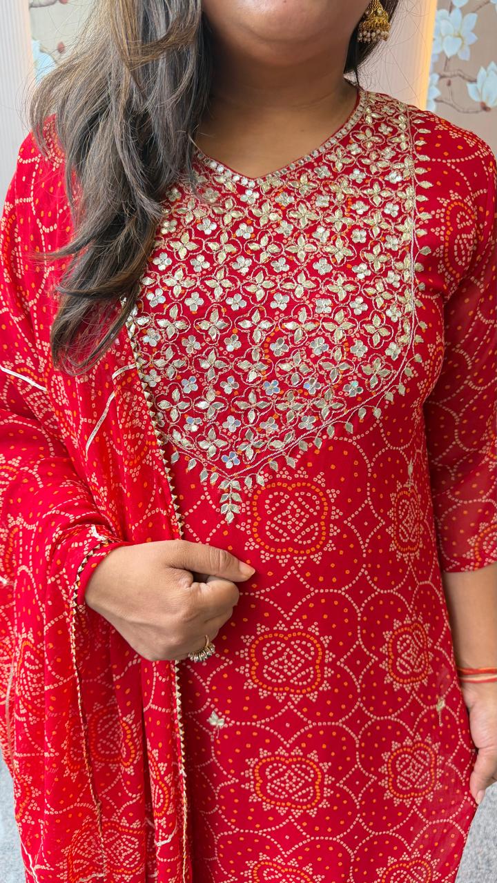 Pretty georgette bandhani with gotta detailing in red