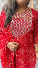 Pretty georgette bandhani with gotta detailing in red