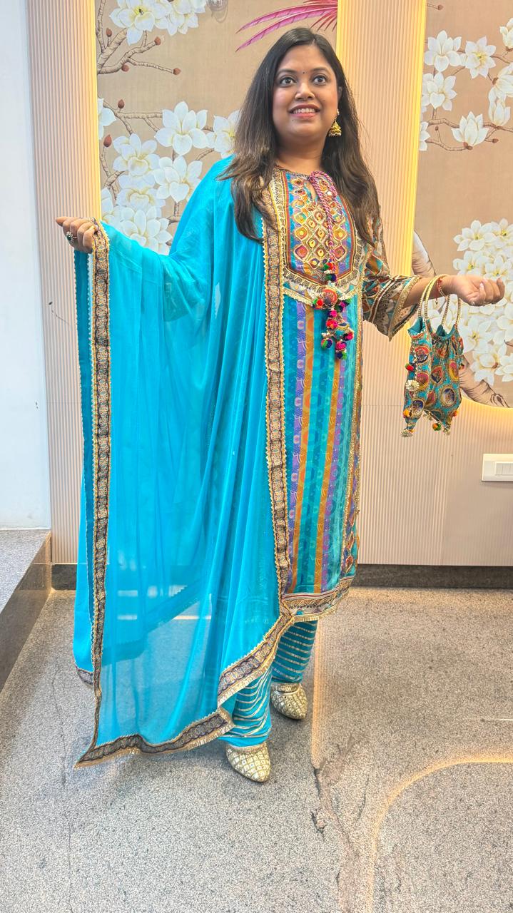 Super pretty pure crepe farshi salwar lining suit set in firozi colour paired with a bag