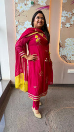 Premium Mul chanderi with pretty applique and gotta detailing in Rani pink