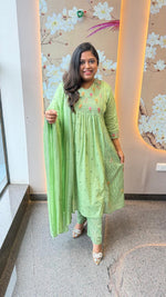 Pretty cotton lining embroidered suit set with pocket and Mul cotton dupatta in mint green