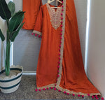 Premium dola silk with zari weaving in the entire kurta and dupatta with zari detailing n Pom Pom lace in orange
