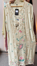 Pretty hand work dola silk suit set with pearl detailing and heavy handwork in cream