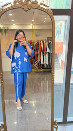 Linen cotton applique work paired with tulip pants and a bag