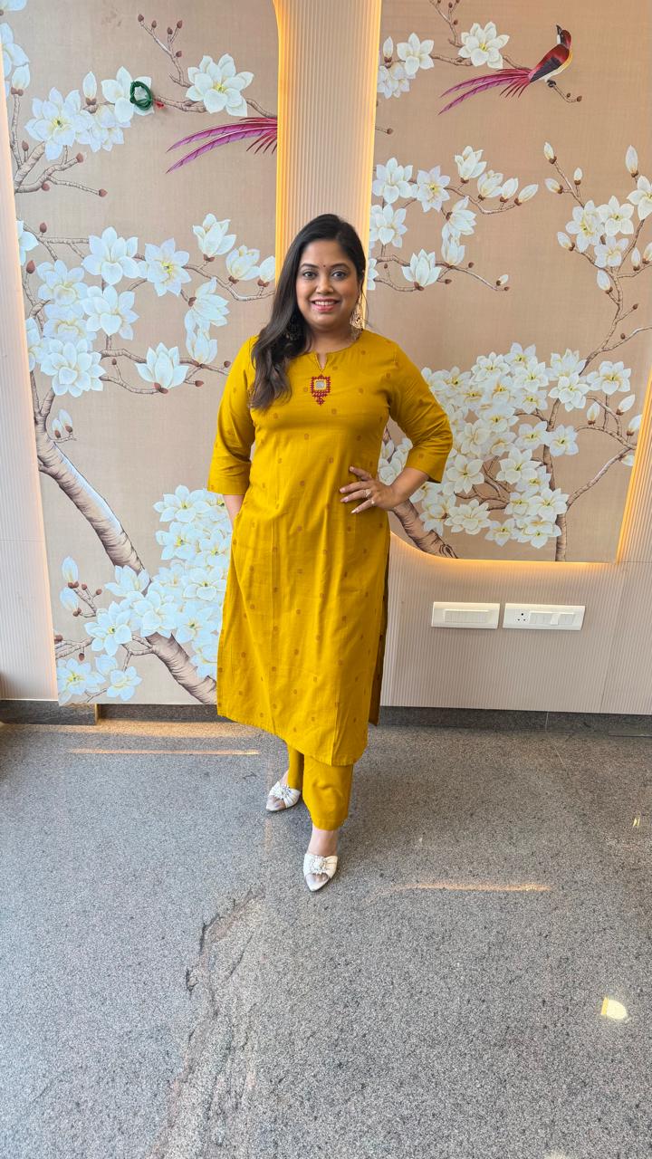 Pretty cotton embroidered kurta pant with mirror work in yellow
