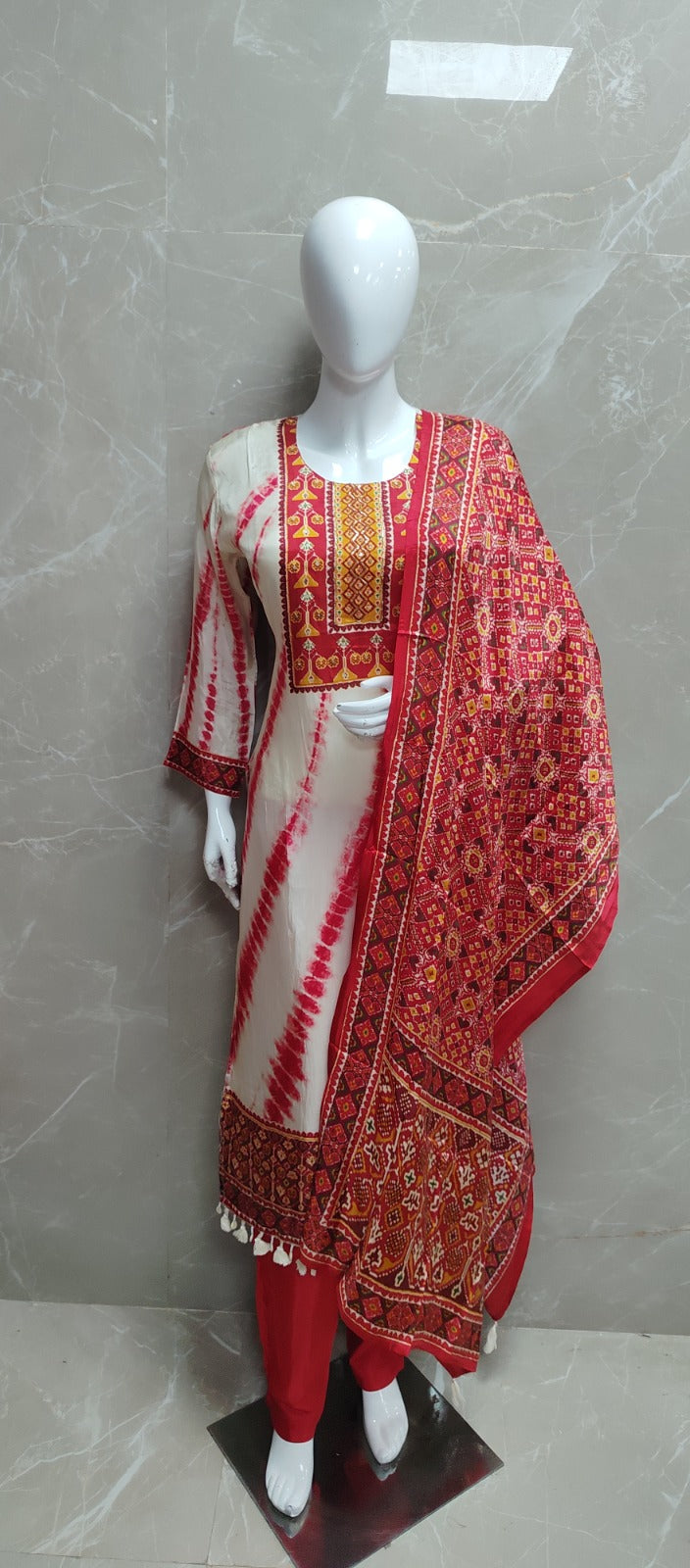 Pretty crepe lining full suit set in red paired with Patola dupatta (true to size )