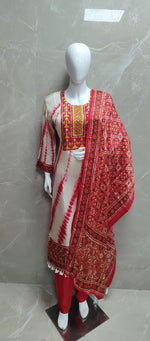 Pretty crepe lining full suit set in red paired with Patola dupatta (true to size )