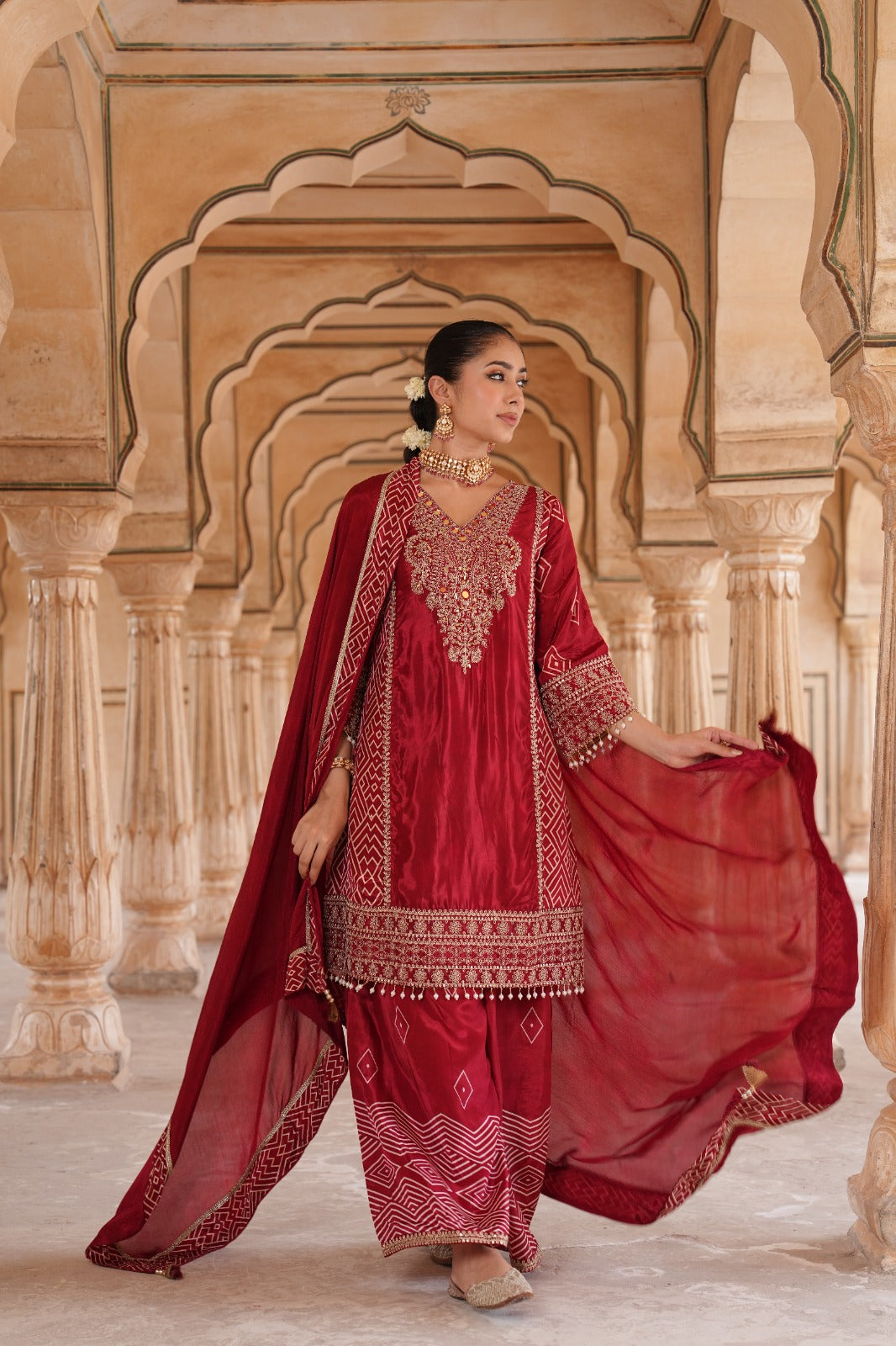 Pure crepe designer with intricate zari detailing suit set in red