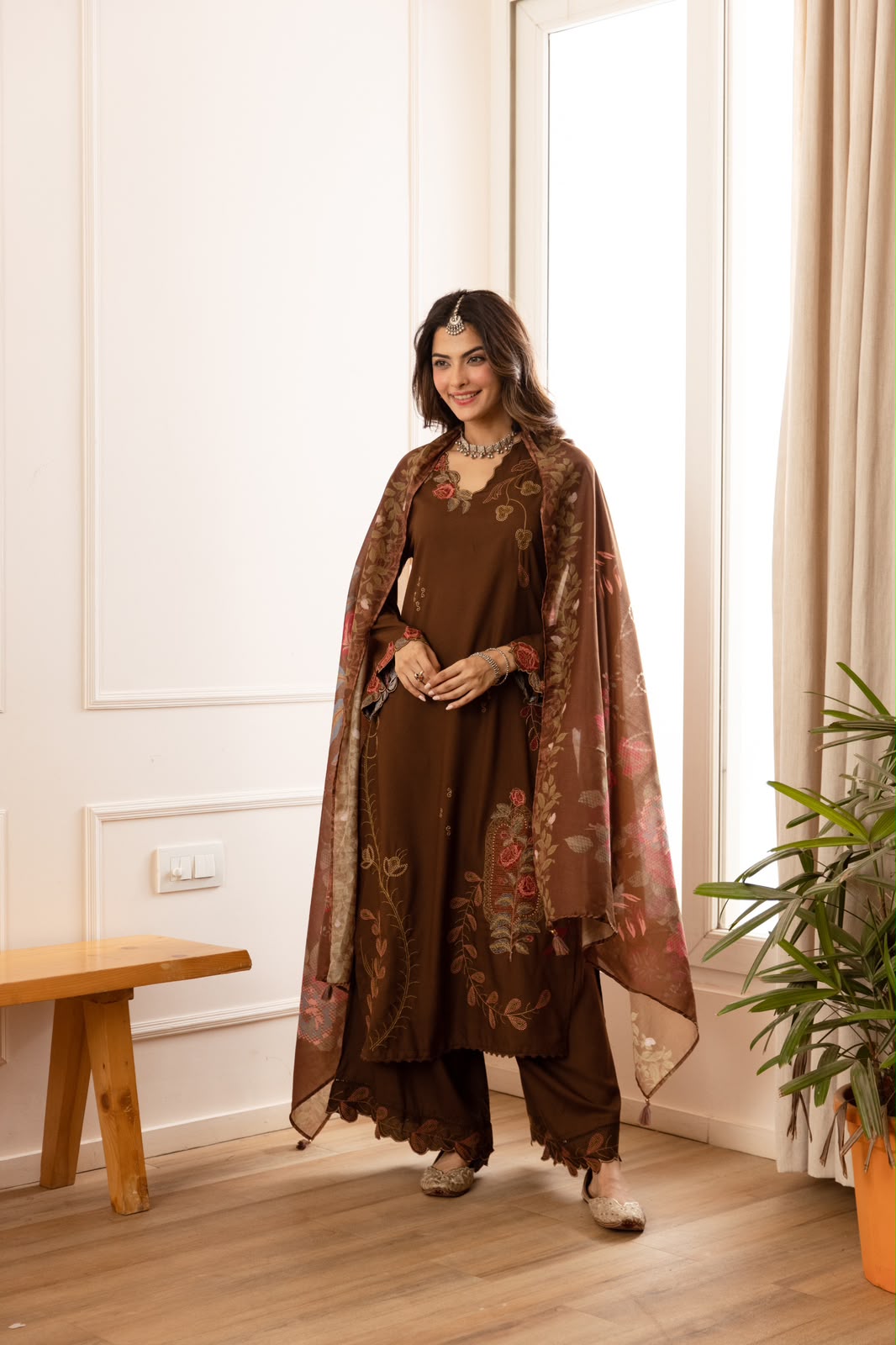Cutwork suit paired with cutwork plazzo heavy slub cotton full suit in brown