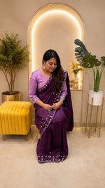 Pretty soft silk saree in wine with handwork comes with stitch blouse