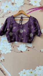 Pretty handwork on blouse and saree in wine