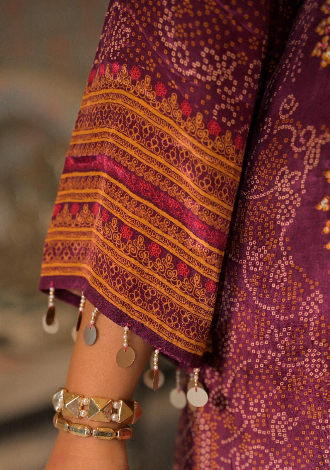 Super pretty crepe silk lining bandhani Phiran paired with pants in wine
