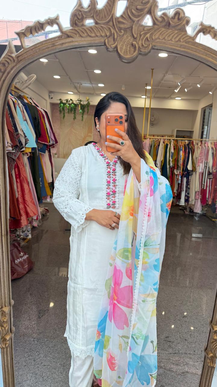 Super pretty neckline with beautiful shifli sleeves paired with a soft shiffon multi colour dupatta silk suit