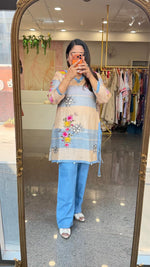 Linen top with beautiful pearl detailing and katha detailing paired softest denim pants