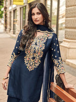 Pretty embellished silk suit paired with georgette sharara and orgenza dupatta
