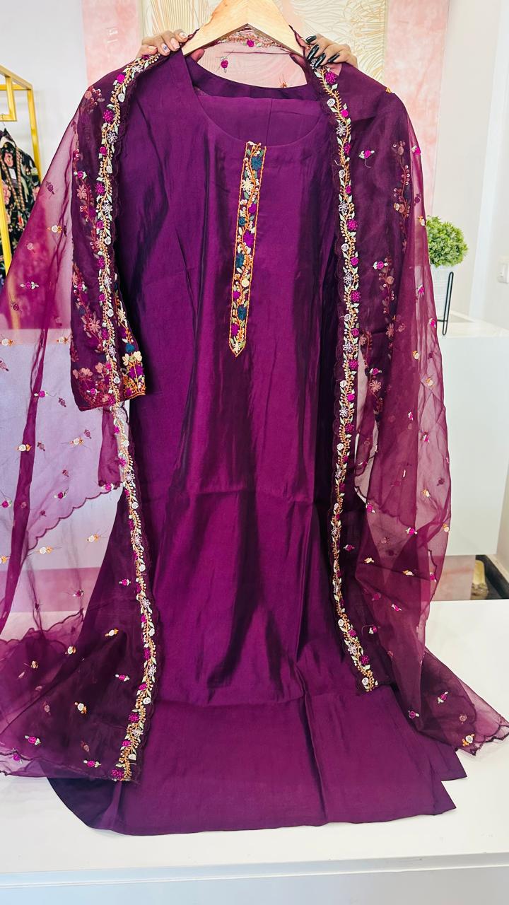 Muslin embroidered suit paired with orgenza dupatta