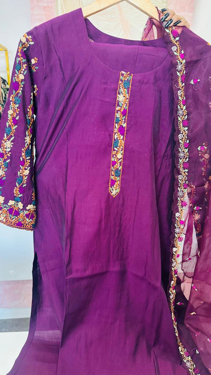 Muslin embroidered suit paired with orgenza dupatta