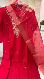 Muslin suit set paired with orgenza dupatta