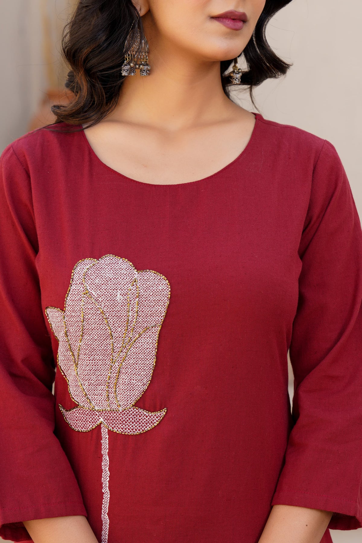 Cotton set with pretty handwork on the kurta in red