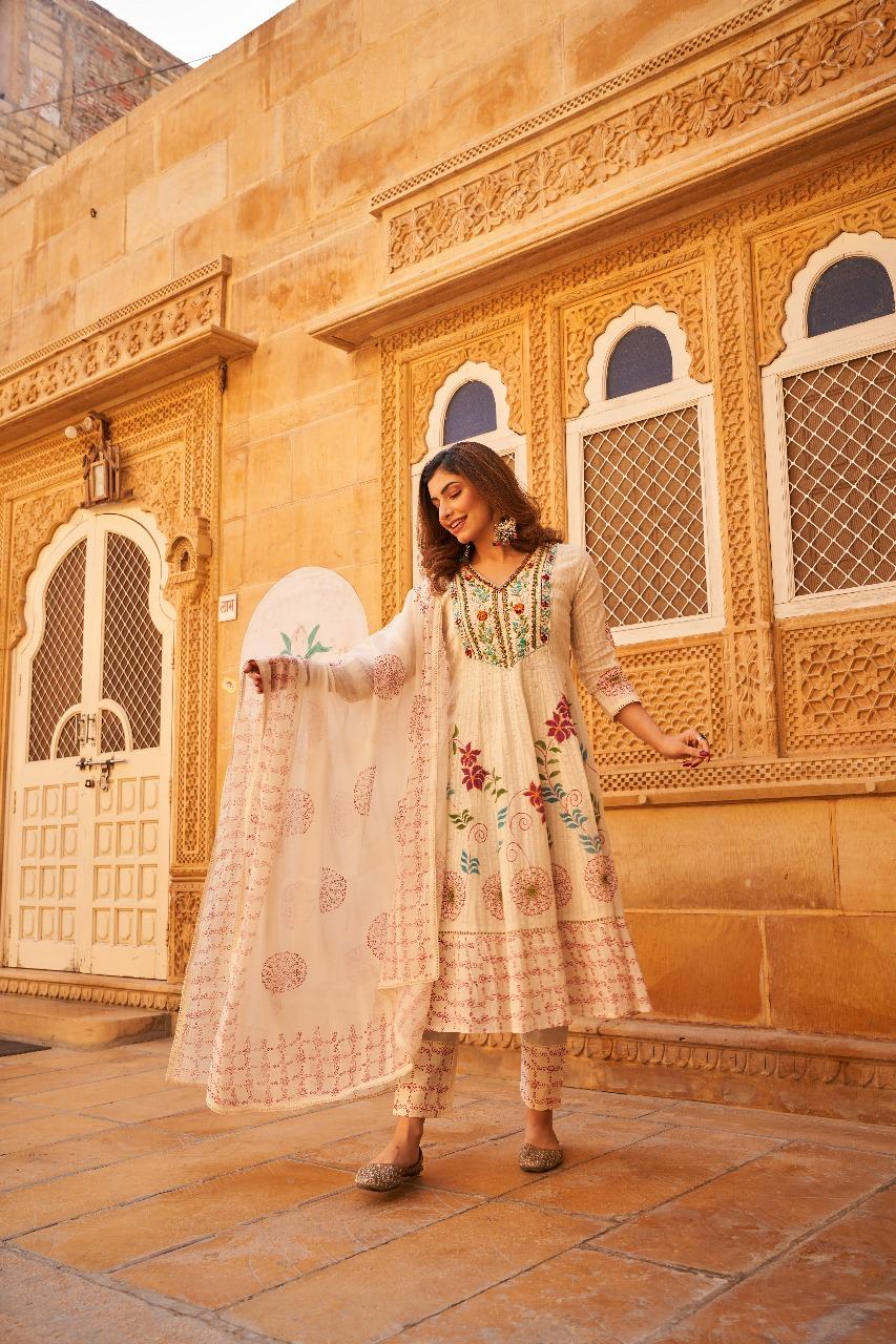 Wow handloom cotton with heavy embroidery on yoke and brush painted all over the piece