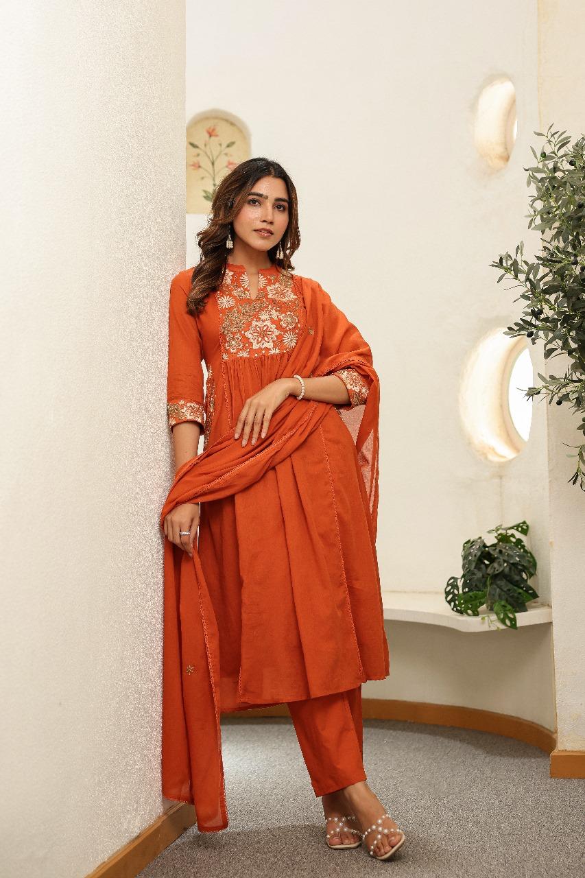 Pure Mul cotton in rust embroidered suit set with designer pocket