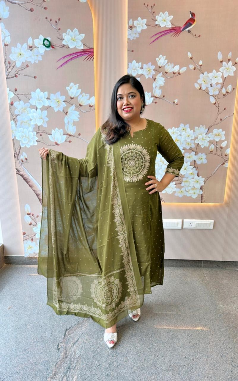 Beautiful green Zari detailing suit set