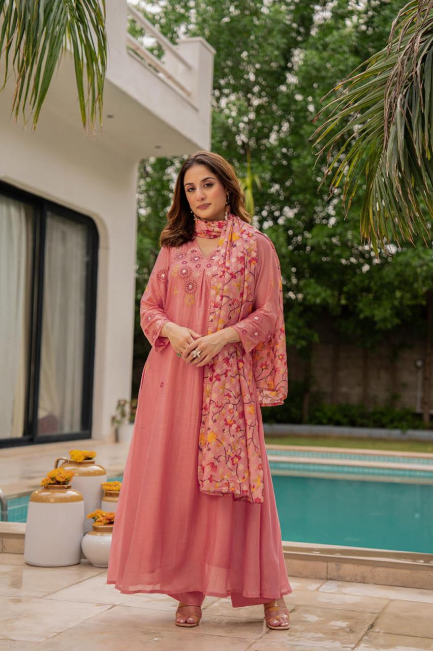 Pink Mul Chanderi suit paired with weaved floral dupatta