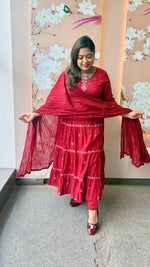 Beautifully embroidered maroon Anarkali suit set