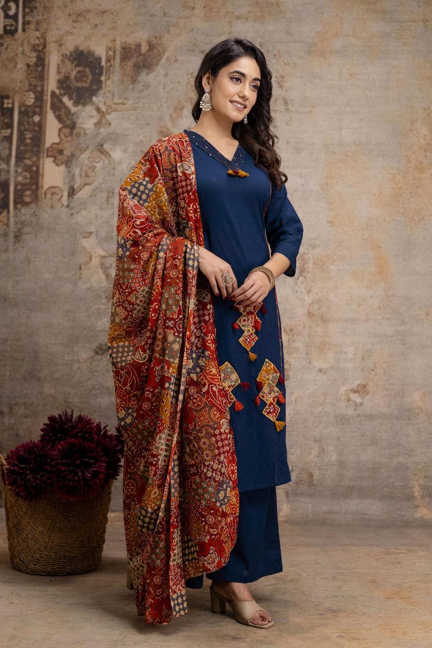 Beautiful applique work suit set in blue