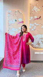 Super pretty Russian silk suit set of re effect paired with Patola dupatta
