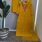 Premium Modale embroidered suit set paired with organza dupatta in yellow