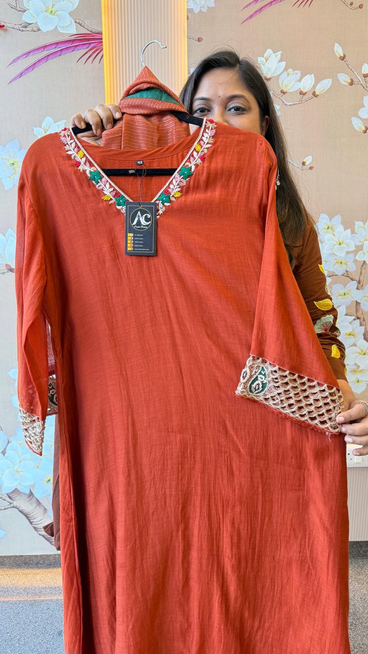 Premium zari detailing on sleeves paired with a tissue dupatta