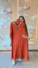 Premium zari detailing on sleeves paired with a tissue dupatta