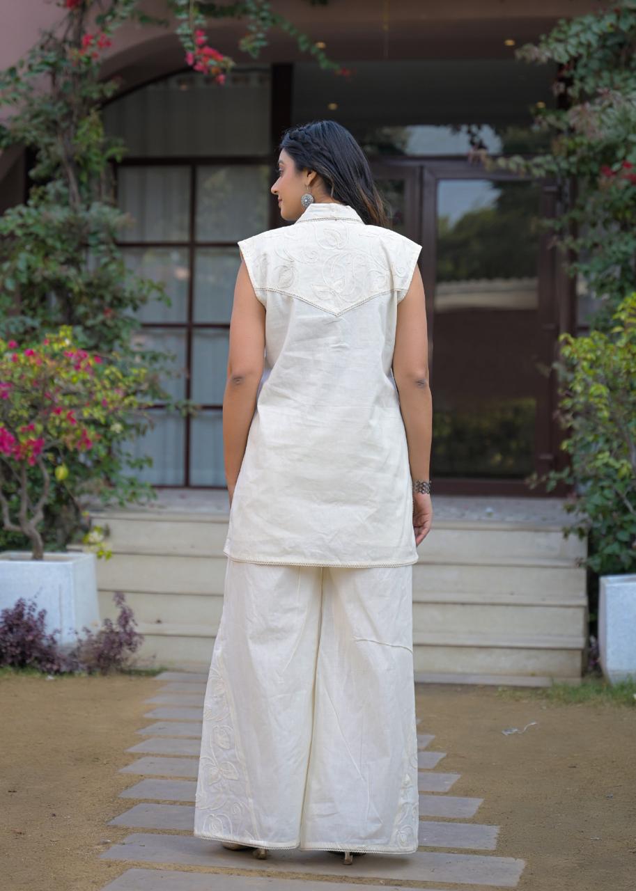 Super smart sleeveless embroidered co ord in white