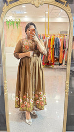 Pure cotton embroidered and applique digital printed gown paired with a detachable jacket