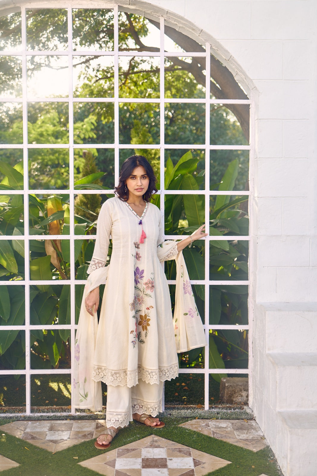 Premium cotton applique work suit set paired with brush painted dupatta. Plus size also available