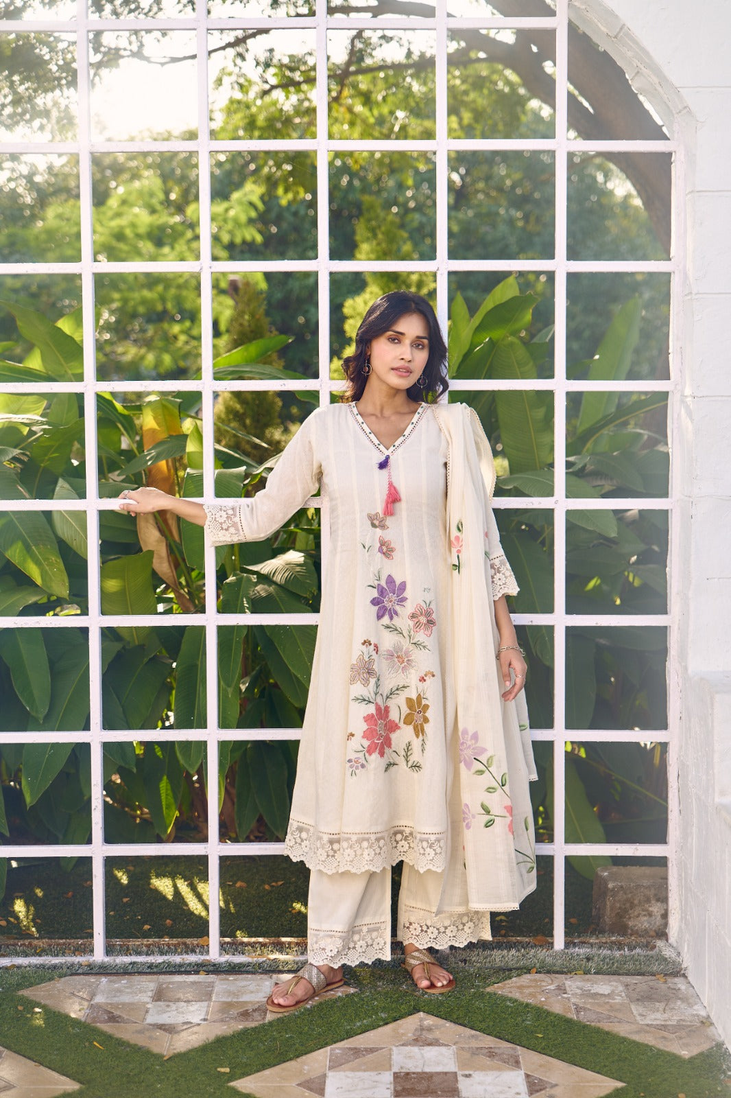 Premium cotton applique work suit set paired with brush painted dupatta. Plus size also available