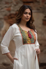 Mul Mul cotton lining applique work full suit set in orange. Kurta has pockets too