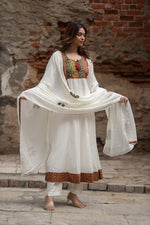 Mul Mul cotton lining applique work full suit set in orange. Kurta has pockets too