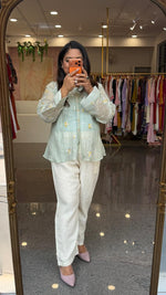 Fully embroidered back and front comes with inner pure Mul chanderi loose fitted shirt paired with pants in mint green