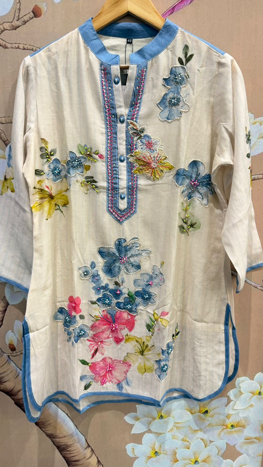 Soft linen top highlighted with pearl detailing and embroidery with lining paired with gorgeous denim
