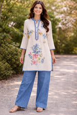 Soft linen top highlighted with pearl detailing and embroidery with lining paired with gorgeous denim
